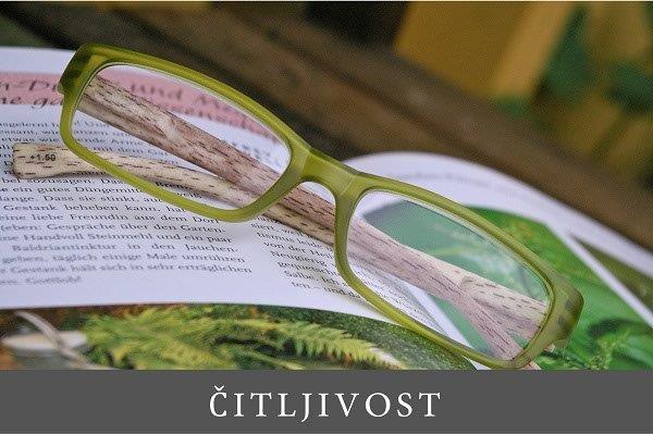 naočare za vid položene na knjigu
